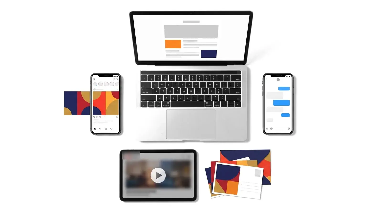 A laptop showing an email, phones showing a social post and text messages, a tablet playing a video and printed postcards.