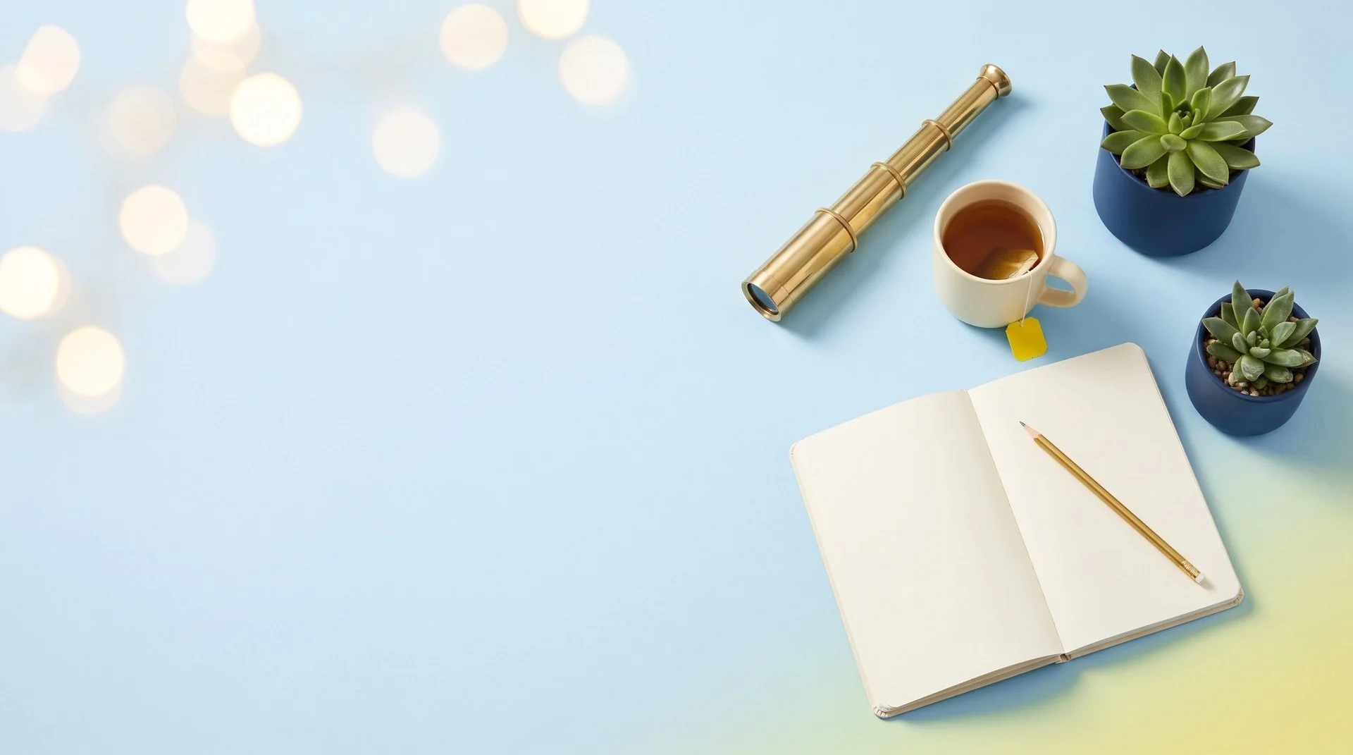 A brass telescope, a cream mug of tea, an open notebook with a gold pencil and potted succulents on a pale blue backdrop fading to light yellow in the corner.