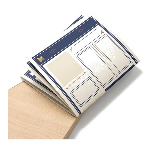 A printed association newsletter fanned open.